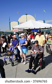 BAKERSFIELD, CA - SEPTEMBER 25: Crowd Attend Senior Day At The Kern County Fair On September 25, 2009 In Bakersfield, California. Admission Was Free For Those Over 55 Years Old.