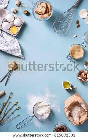 Similar – Image, Stock Photo From above of Easter-themed flatlay featuring a nest with speckled eggs, surrounded by soft feathers and pussy willow branches on a textured background