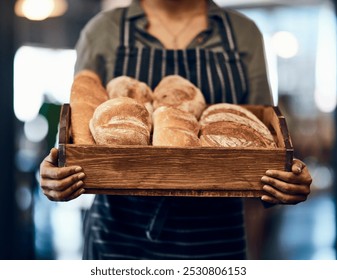 Bakery, basket and hands of waiter with bread for serving food, products and pastry for small business. Restaurant, cafeteria and person for service, help and baked goods for hospitality in store - Powered by Shutterstock