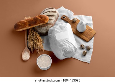 Bakery Branding Mockup, Wrapped In Paper Bread, Wheat, Empty Space To Display Your Logo Or Design.