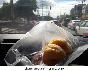 Bakery In Car On Trafic Jam Road.