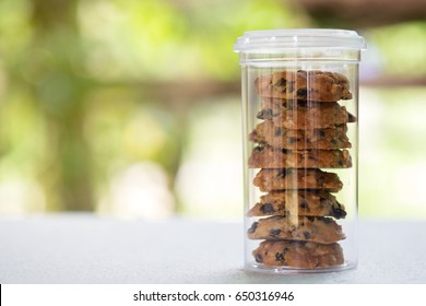 Bakery Cookie In Plastic Jar Packaging On Table.