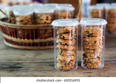 Bakery Cookie In Plastic Jar Packaging On Table.