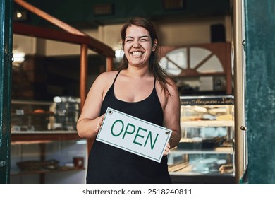 Bakery, open sign and portrait of woman in store for small business, entrepreneur and restaurant. Coffee shop manager, barista and waitress with person for food service, server and hospitality - Powered by Shutterstock