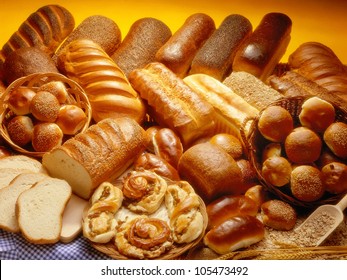 Bakery product assortment with bread loaves, buns, rolls and Danish pastries - Powered by Shutterstock