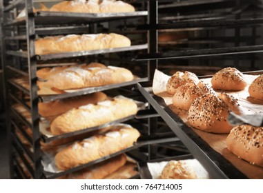Bakery products on shelving, indoors - Shutterstock ID 764714005