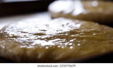 Bakery Working Process. Making Sweet Cake Process in a Professional Bakery Kitchen. Sweets Bakery Production Process with Bakers at Work. Confectionery Manufacturing and Industrial Pastry Preparation. Pastry and Dessert Making Concept, Food Production, Culinary Craftsmanship and Fresh Baked Goods Industry