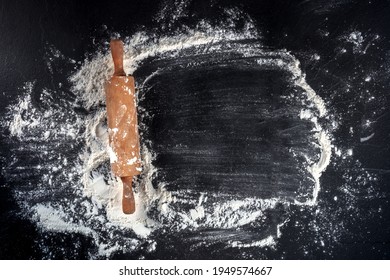 Baking Background With White Flour And A Rolling Pin, Overhead Shot