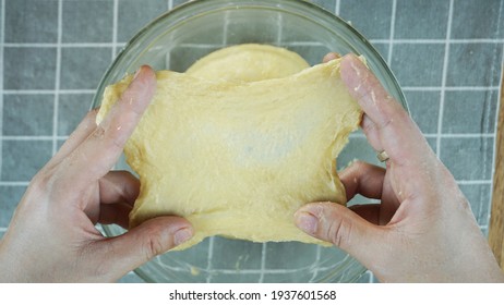 In baking bread or donuts, you have to knead the dough the right way to reach windowpane stage.
You can do windowpane test on the dough. It should be smooth and didn't tears apart when you stretch it