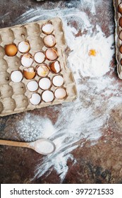 Baking Cake Ingredients - Bowl, Flour, Eggs, Egg Whites Foam, Eggbeate On Wood Chalkboard From Above. Cooking Course Or Kitchen Mess Poster Concept. Flat Lay. Rustic Style