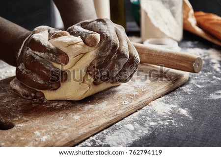 Similar – Image, Stock Photo Baking bread in a historic oven.