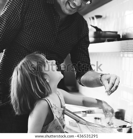 Similar – child girl playing checkers with her dad