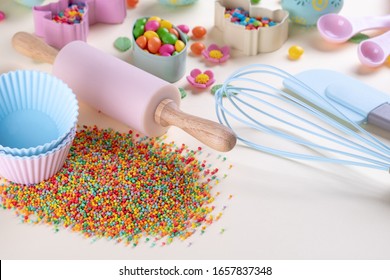 Baking And Cooking Concept. Cookie Cutters, Whisk, Roller Pin And Kitchen Bake Tools For Making Sweets. Top View Of A Holiday Baking Still Life. Sweet Recipe Cookbook.