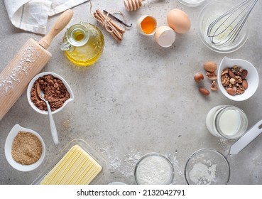 Baking and Cooking Ingredients and tools with Flour Eggs Rolling Pin Butter. Top View Copy Space
