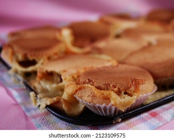 Baking Cupcake Buns Disaster On Pink Background Medium Shot Selective Focus