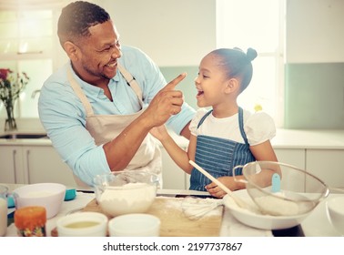 Baking Dad, Funny Daughter And Flour Nose Messy Joke From Happy Learning, Laughing Child Development And Bonding In Kitchen. Parent, Kids And Family Home With Cute, Playful And Sweet Comedy Together