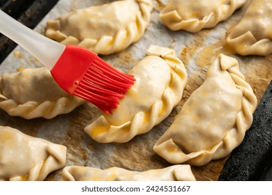 Baking delicious Argentine empanadas with chicken and vegetables. - Powered by Shutterstock