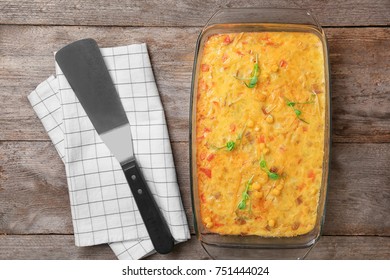 Baking Dish With Corn Pudding On Table