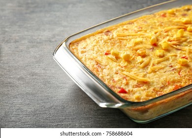 Baking Dish With Corn Pudding On Table