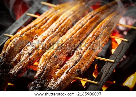 Baking eels at an eel restaurant in Japan