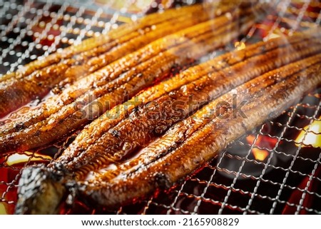 Baking eels at an eel restaurant in Japan