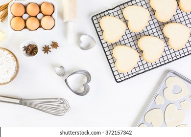 Baking heart shaped sugar cookies for Valentines Day. - Powered by Shutterstock