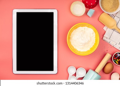 Baking ingredients with empty tablet on pink background, flat la - Powered by Shutterstock