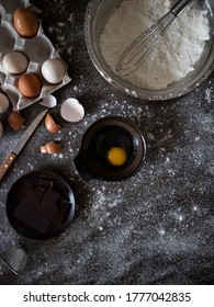 Baking Ingredients Flatlay With Copy Space. Cooking Ingredients On Black Table.