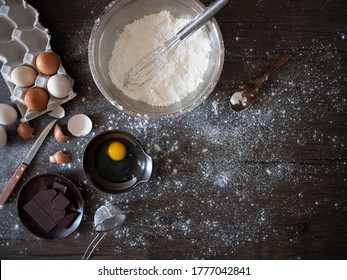 Baking Ingredients Flatlay With Copy Space. Cooking Ingredients On Black Table.