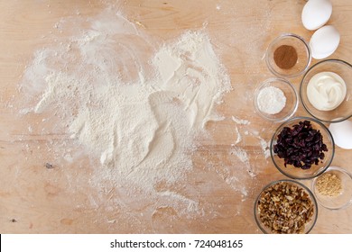 Baking Ingredients On Kitchen Table. Products For Filling Cupcakes Prepare For Cooking On Wooden Cutting Board. Overhead Lifestyle Food Concept With Copy Space.