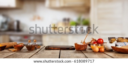 Baking ingredients placed on wooden table, ready for cooking. Copyspace for text. Concept of food preparation, kitchen on background. ストックフォト © 