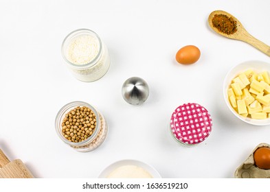 Baking ingredients and utensils on white background. Cooking or baking cake, cookies, pastry or bread concept. Top view, recipe, menu

 - Shutterstock ID 1636519210
