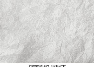 Baking paper sheet isolated on white background, top view. Parchment for baking culinary.