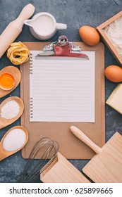 Baking And Pastry Tools With Notebook On Vintage Background