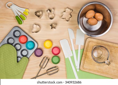 Baking And Pastry Tools On Wooden Background