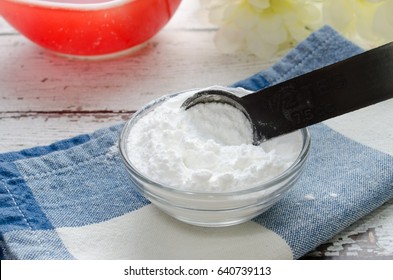 Baking Powder Being Measured For A Recipe.