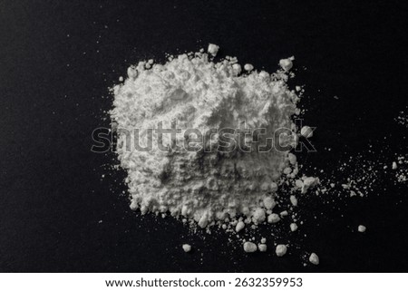 Baking powder and black background