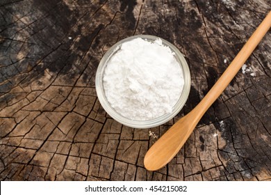 Baking Powder On Wooden Background 