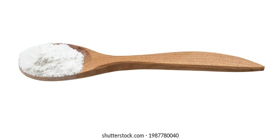 baking powder in wooden spoon isolated on white background