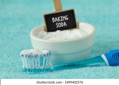 Baking Soda In A Bowl With A Toothbrush - Teeth Whitening