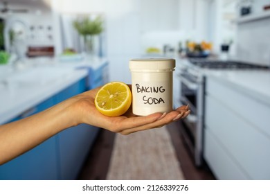 Baking Soda, Lemon, Cooker, Stove, Oven, Kitchen Unit, Kitchen Sink And Cleaning Kitchen. Natural And Eco-friendly Cleaning Products In Hand
