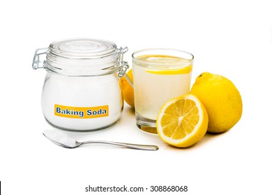 Baking soda with lemon juice in glass for multiple holistic usages