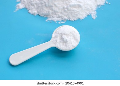 Baking Soda On Blue Background.