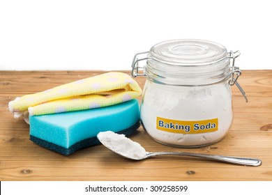 Baking Soda With Sponge And Towel For Effective And Safe House Cleaning