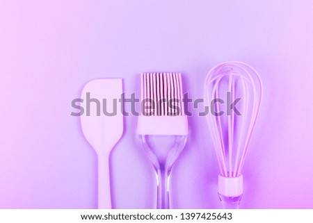 Baking tools set on neon duotone background. Flat-lay, top view. Copy space for text.