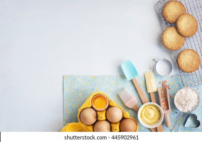 Baking Utensils, Fresh Ingredient And Cookies On Pastel Light Blue Background. Flat Lay Bakery Text Space Images.