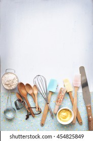 Baking Utensils And Ingredients On Pastel Light Blue Background. Flat Lay Bakery Text Space Images.