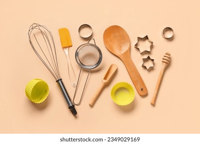 Baking utensils on beige background - Powered by Shutterstock