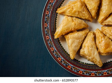 Baklava - an arabian sweet made with baked filo, stuffed with crushed nuts and basted with honey or sugar syrup. - Powered by Shutterstock