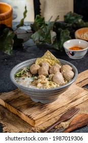 Bakso or baso is an Indonesian meatball, Its texture is similar to the Chinese beef ball, fish ball, or pork ball. The word bakso refer the complete dish of beef broth soup, noodle, tofu and bok choy. - Shutterstock ID 1987019306